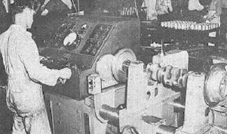 Checking balance on a crankshaft for a Kaiser-Frazer 226cubic in, engine, Detroit Engine Division plant, 1947  (K-F took over the Continental Engines facility on East Jefferson at the end of 1946)