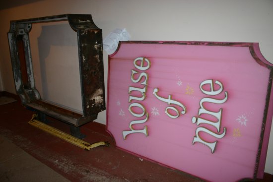 House of nine sign about to be refurbished.