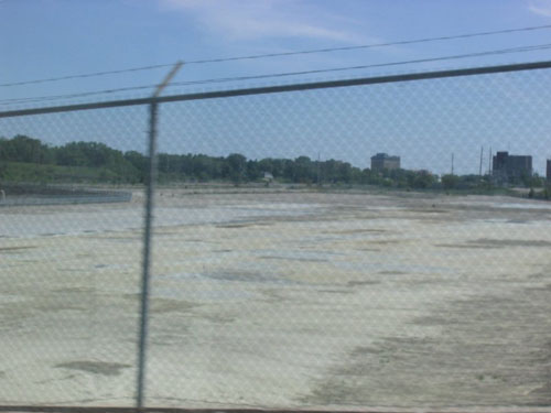 World's largest, paved, fenced in, piece of Flint - old Chevrolet plant site... anything new going on here?  This was taken in May 06.
