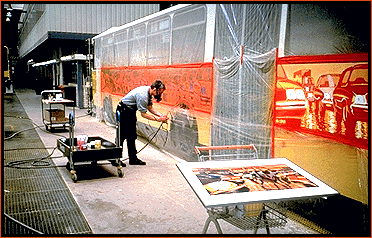 Lowell Boileau making micropointillist painting on a bus in Stuttgart in 1992